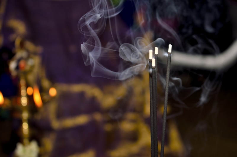 Incense sticks at a village festival, India