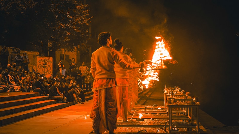 Silhouettes against sacred fire, Rishikesh