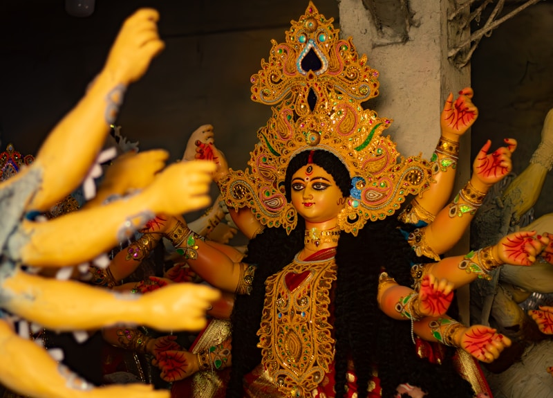 Goddess Durga idol with multiple arms and ornate crown